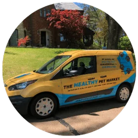 Four Muddy Paws van delivering natural pet food to St. Louis and Edwardsville customers